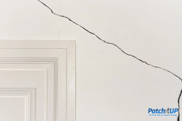 What Causes Hairline Cracks Around Doors and Windows in Suffolk County Homes?